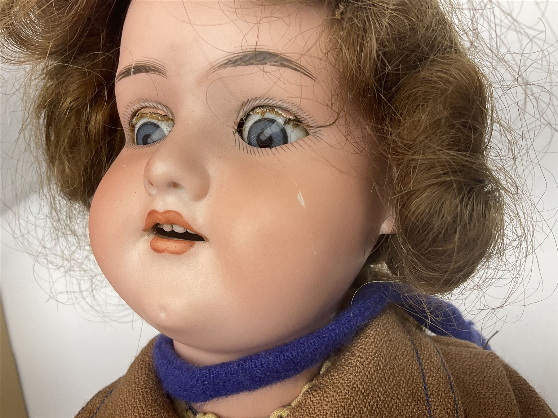 Catterfelder Puppenfabrik Germany bisque head baby doll with moulded hair, sleeping eyes, open mouth with teeth and trembly tongue, and composition body with jointed limbs; marked 'C.P. 208/50 V S' H50cm; together with an Armand Marseille bisque head doll with applied hair, sleeping eyes, open mouth with teeth and composition body with jointed limbs; marked 'Made in Germany Armand Marseille 390n D.R.G.M. 246/1 A. 6 M.' H56cm (2)