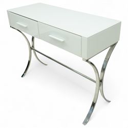 Contemporary white and chrome console dressing table, rectangular top over twin drawers with integral bar handles, raised on curving polished chrome supports united by a tubular stretcher