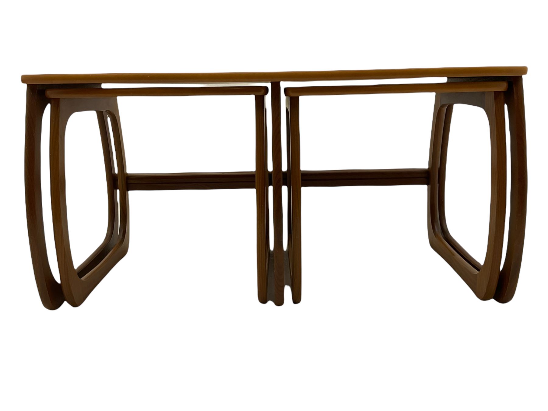 Nathan - teak Long John nest of tables and a singular nest of tables 