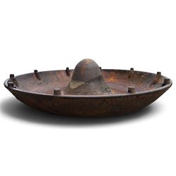 Two early 20th century cast iron ‘Mexican hat’ pig trough planters, each of circular dished form with central domed boss, one fitted with fixing studs for radial feeding divisions
