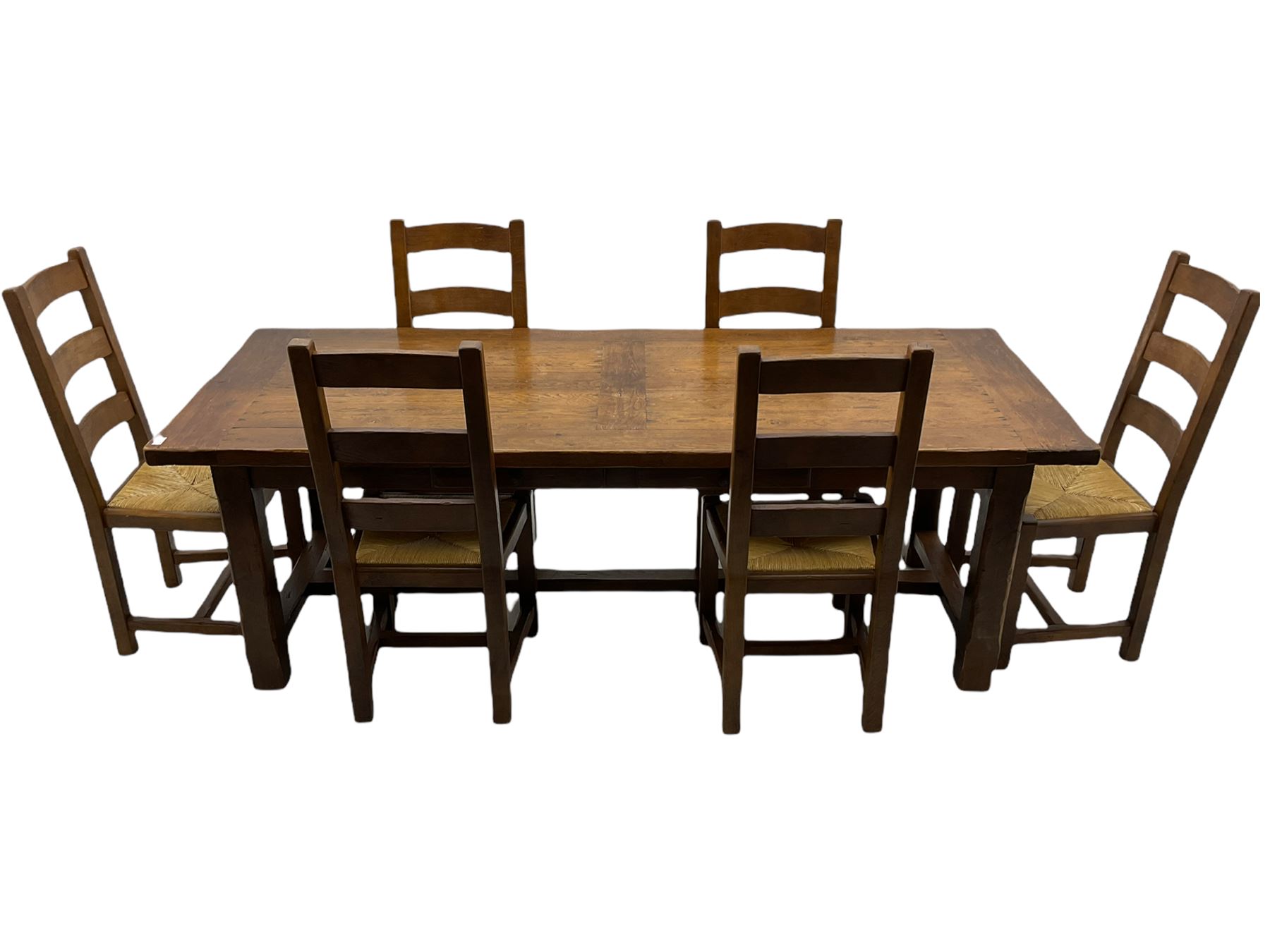 Antix French oak dining table with two leaves, two frieze drawers;, and six ladder back chairs with rush seats