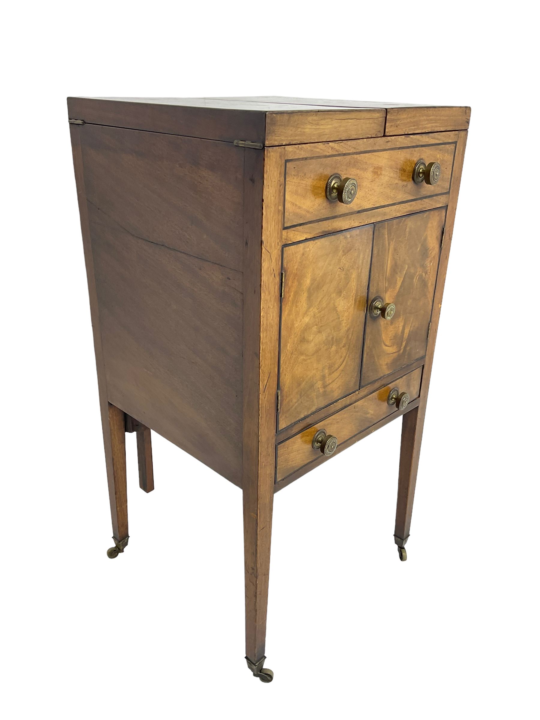 Georgian mahogany washstand cabinet, the double hinged lid opens to reveal wash basin and lift up tilting mirror, false drawer over double cupboard and drawer, on square supports with brass cups and castors