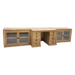 'Lizardman' oak kneehole desk fitted with six drawers and two glazed bookcases, by Derek Slater of Crayke, W347cm, H72cm, D61cm
