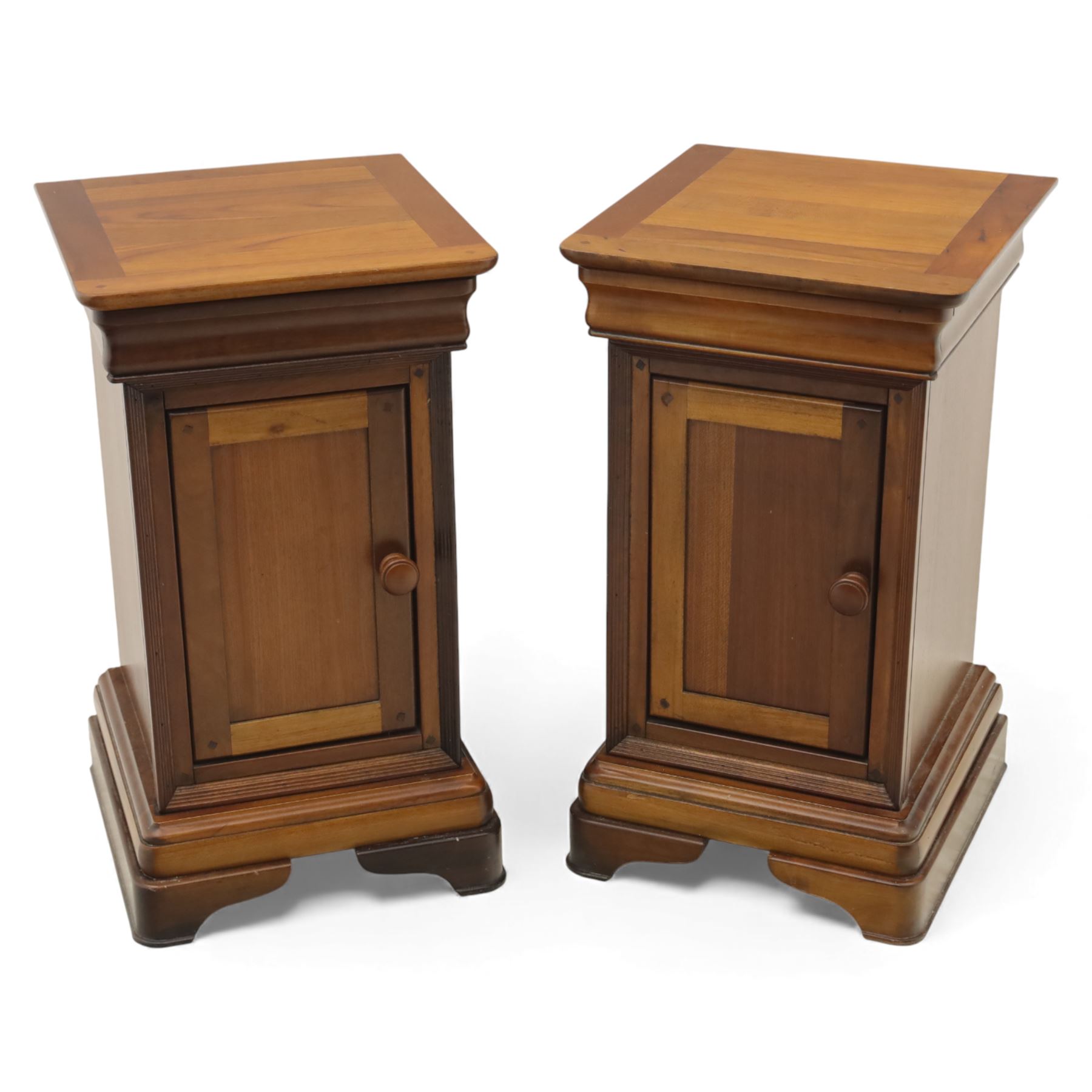 Willis & Gambier - French cherry wood bedside cabinets, each with square moulded top, frieze baize lined drawer and single cupboard door, raised on shaped plinth bases