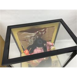Japanese doll, dressed in traditional Japanese dress, within wooden glazed box, box H40cm