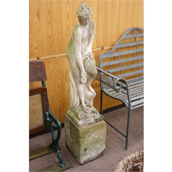  Composite garden statue of a part naked female, on square pedestal, H130cm  