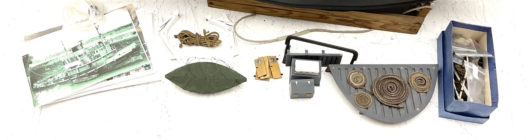 Large model of the tugboat 'Dhulia' on a wooden stand L144cm, together with a box of additional parts and plans