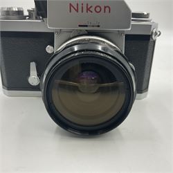 Nikon photomic Ftn camera body, with red engraving, serial no 7006572, circa 1969, with 'Nikon NIKKOR-O Auto 1:2 f=35mm' lens, serial no. 830478