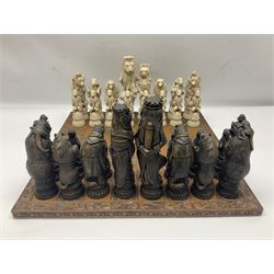 Chess set and resin chess pieces moulded as various animals, the pawns as monkeys, Kings as lions etc, board L46cm, W46cm, king H19cm