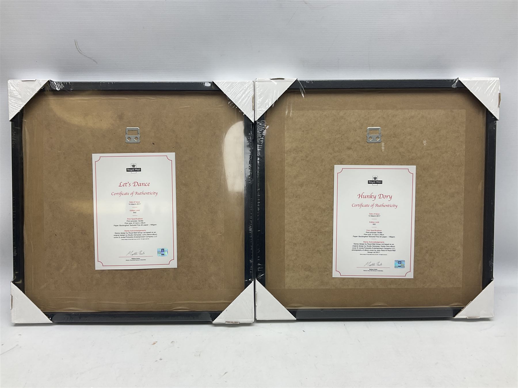 Set of four Royal Mail David Bowie limited edition album stamp prints, comprising Heroes, Ziggy Stardust Tour, Hunky Dory and Let's Dance, all framed and in original packaging, H43cm W43cm