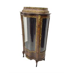 Early 20th century French kingwood vitrine or display cabinet, decorated with applied foliate cast band, serpentine glazed door and sides, inlaid with marquetry decoration of floral bouquets and branches, cartouche mounts to the apron, raised on cabriole supports