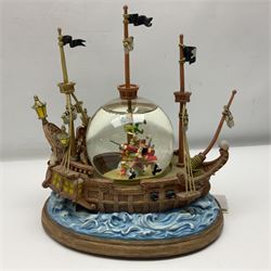 Disney musical snowglobe, in the form of the pirate ship from Peter Pan, H28cm