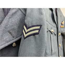 Two post-WWII British Army No.2 Dress tunics, one with Green Howards buttons; army shirt dated 1951; Royal Fleet Auxilliary jacket with trousers; three RAF/WAAF uniforms and RAF Greatcoat; and three canvas/webbing bags, two dated 1943 & 1945