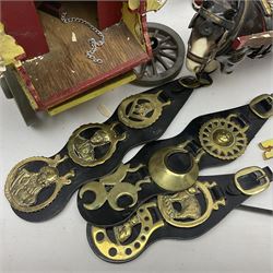 Two ceramic shire horse and gypsy caravans, together with horse brasses 