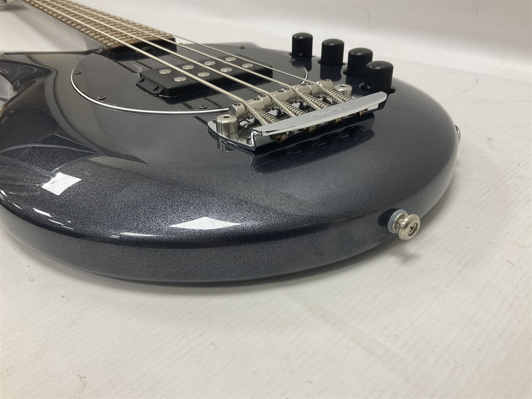 Music Man Bongo 4 string bass guitar, in sapphire black finish, serial no F42547, in black Music Man hard case, guitar L113cm