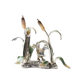 Silver and enamel model of a mallard taking flight from bulrushes and on a naturalistic base  H7cm x W7cm marked 925