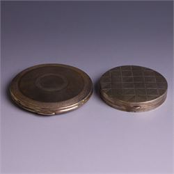 Two silver circular compacts, including Continental 800 silver example with geometric decoration, stamped 800 and a Kigu example with engine turned concentric circle decoration, hallmarked Kigu Ltd, London 1963, largest D7.5cm