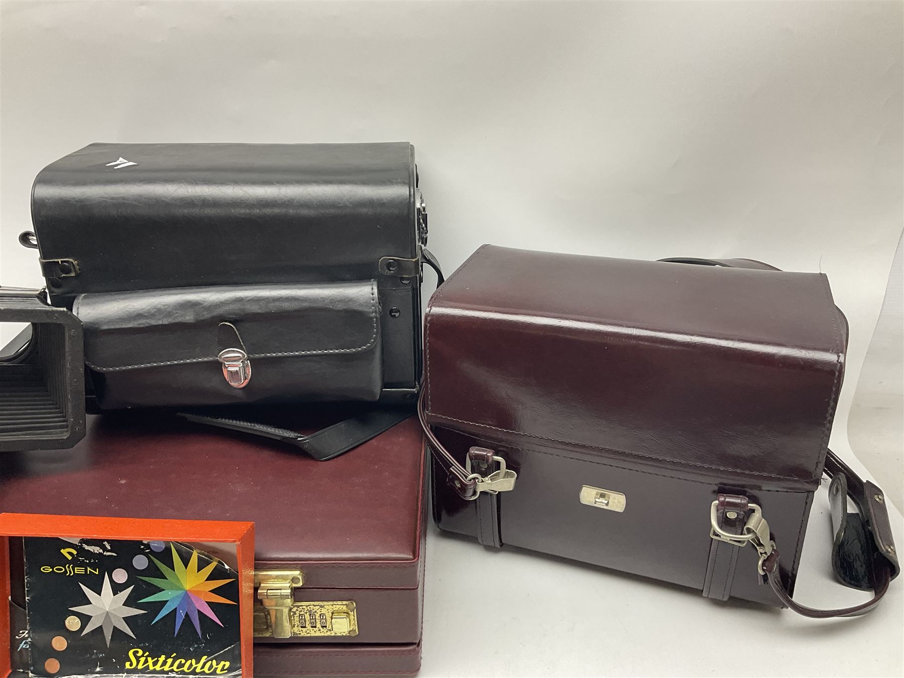 Collection of leather camera cases, to include Nikon ever ready cases and two larger cases, together with Gossen Sixticolor light meter, in box and other camera equipment 