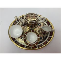 Royal Crown Derby Imari pattern miniature cabaret set, comprising tray, teapot, milk jug, sucrier, teacup and saucer