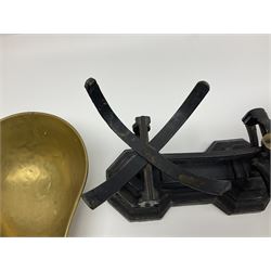 Black painted and brass kitchen balance scales with graduated set of brass weights