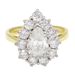  18ct gold diamond cluster ring, central pear shaped diamond surrounded by eleven round diamonds hallmarked, central pear approx 1 carat, diamond surround total approx 0.9 carat  