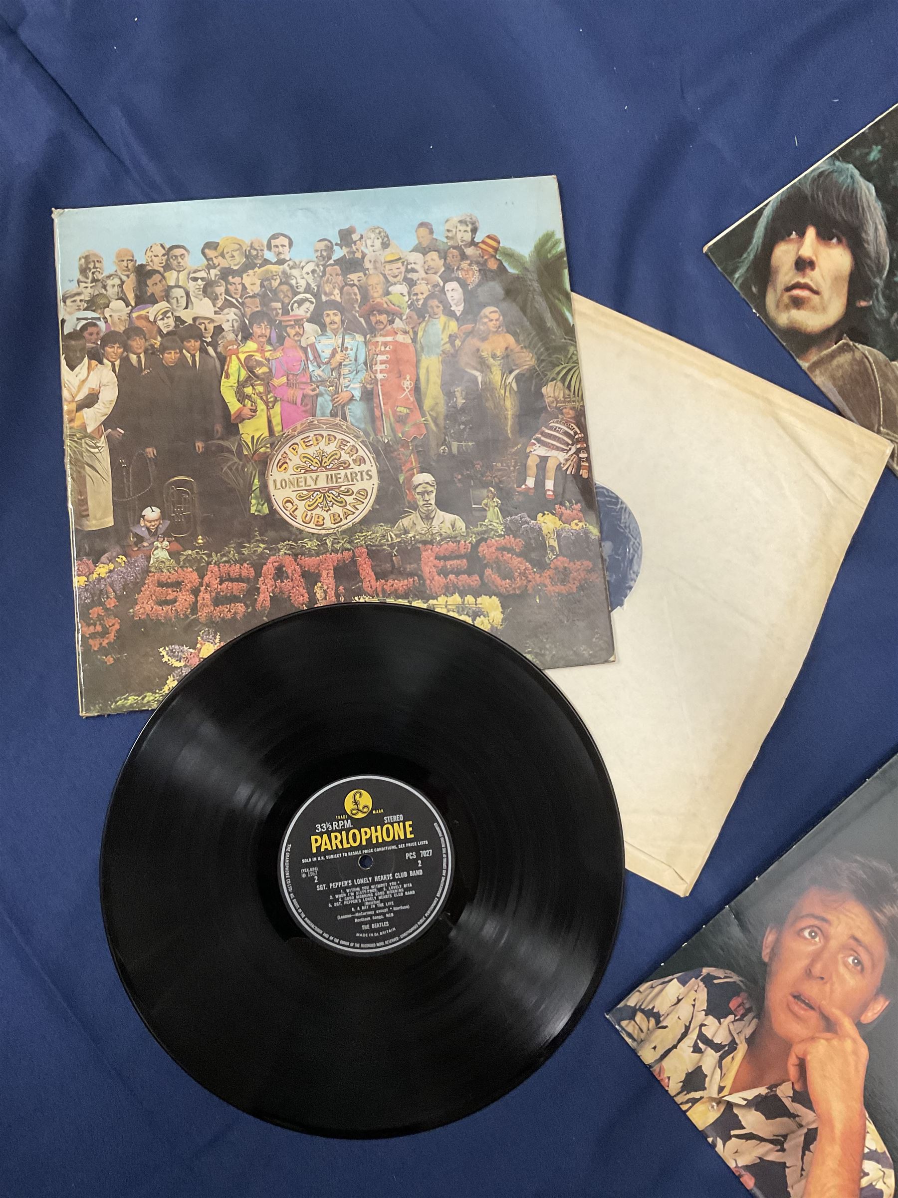 The Beatles vinyl LPs including 'The White Album' no 0260028 with poster', 'Help', 'Rubber Soul', 'Sgt. Peppers Lonely Hearts Club Band', 'A Hard Day's Night' etc (12)