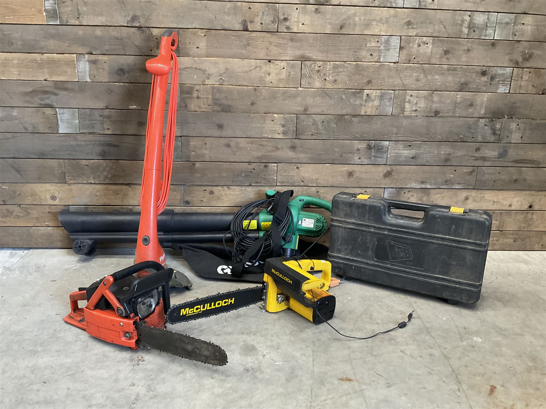 Workx electric lawnmower with two batteries, charger and dock, Garden Gear telescopic chainsaw, McCulloch chainsaw, another chainsaw, Flymo strimmer, GardenLine vac and a JCB drill