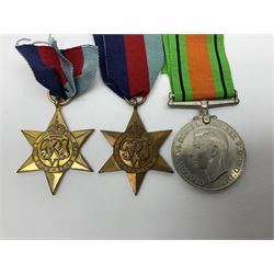 Twelve WW2 medals comprising four 1939-1945 war medals, four Defence medals, three 1939-1945 Stars and Africa Star; all with ribbons; some as groups in two issue boxes with slips