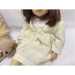 Two Zapf Creation limited edition designer collection dolls, by Brigette Paetsch, the first example with faux suede jacket, red jumper and denim skirt, no. 460, the second example 'Linda' in white dress with teddy bear accessory, no. 785, each signed B Paetsch, tallest L60cm