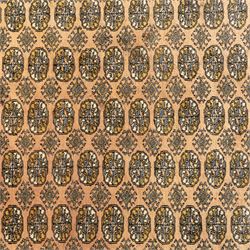 Bokhara rug, rose ground, with multiple rows of ivory and indigo guls enclosed by narrow geometric borders in tones of ivory, grey, and gold