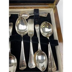 An oak cased silver plated canteen of cutlery for six, (stainless steel bladed knives).
