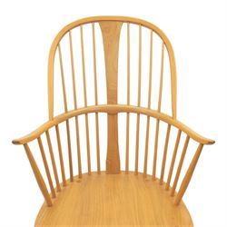 Ercol - Windsor 'Chairmakers' light ash armchair, with traditional spindle backrest, above a dished seat, with cylindrical supports united by a carolean stretcher