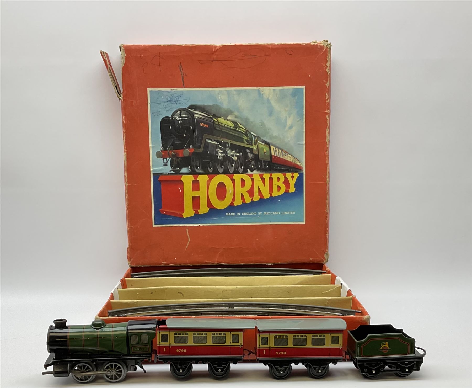 Hornby '0' gauge - Passenger Set No.21 with clockwork No.20 type 0-4-0 tender locomotive No.60985, two coaches and track, boxed; and Tank Passenger Set No.101 for spares or repair with clockwork No.101 type 0-4-0 tank locomotive No.2270, three coaches and track, boxed (2)