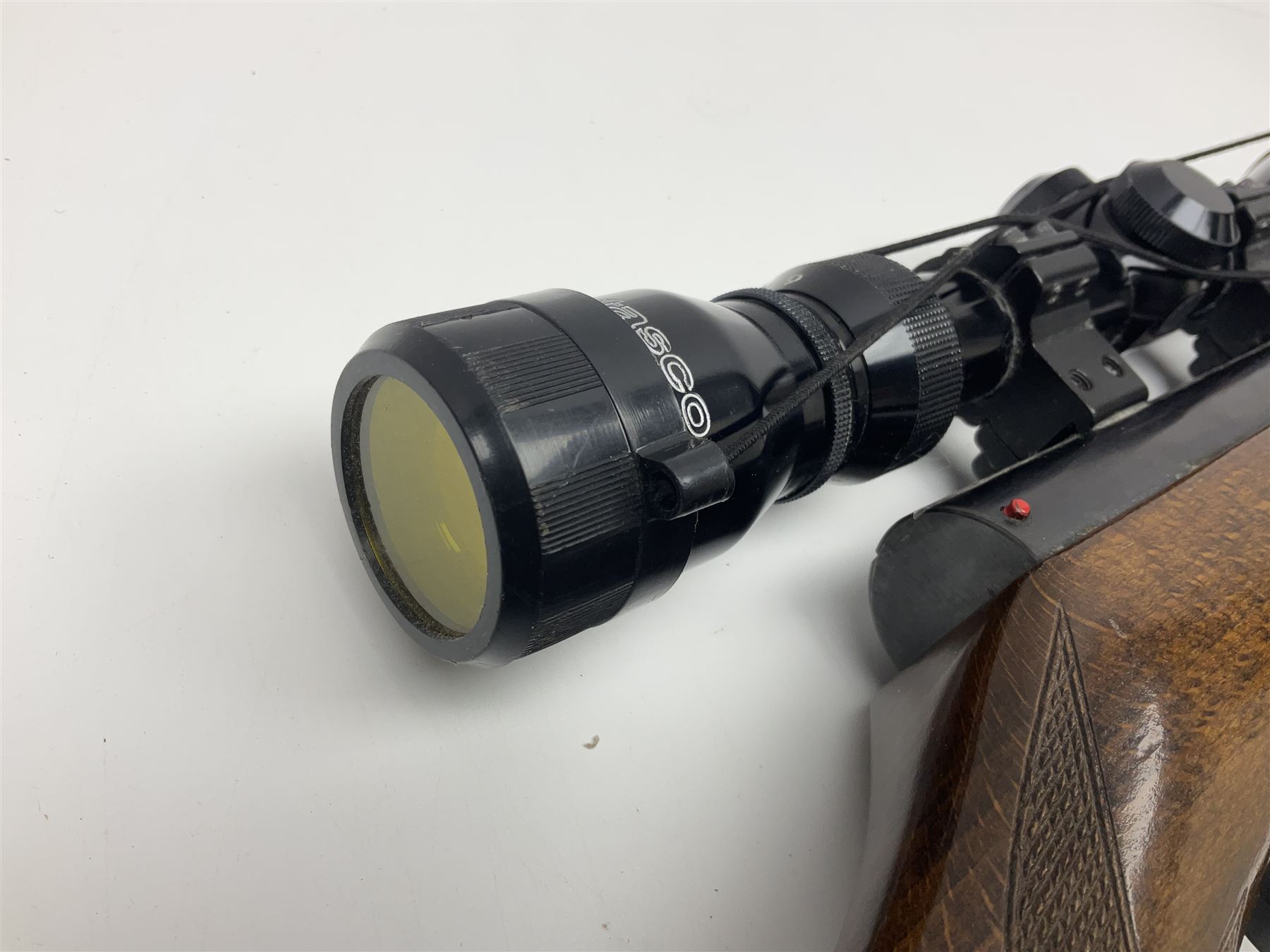 Weihrauch model HW 77 K  .22 air rifle with under lever action, beech stock with chequered pistol grip and Tasco WA39x40-1 scope, serial no.1283661 L102cm overall NB: AGE RESTRICTIONS APPLY TO THE PURCHASE OF THIS LOT