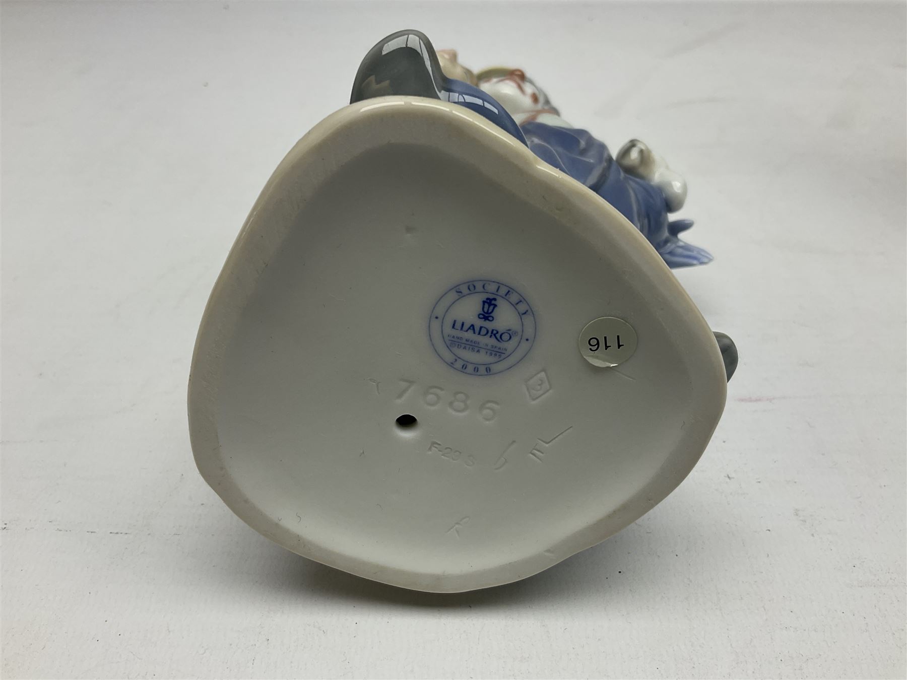 Three Lladro figures, comprising Little Jester no 5203, Pals Forever no 7686 and Naughty Girl no 5006, H25cm