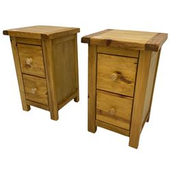 Pair of pine two drawer bedside lamp chests