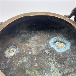 Chinese cast brass censer, with applied dragon twin handles and decoration, raised upon three feet with character mark beneath, D12cm H9.5cm