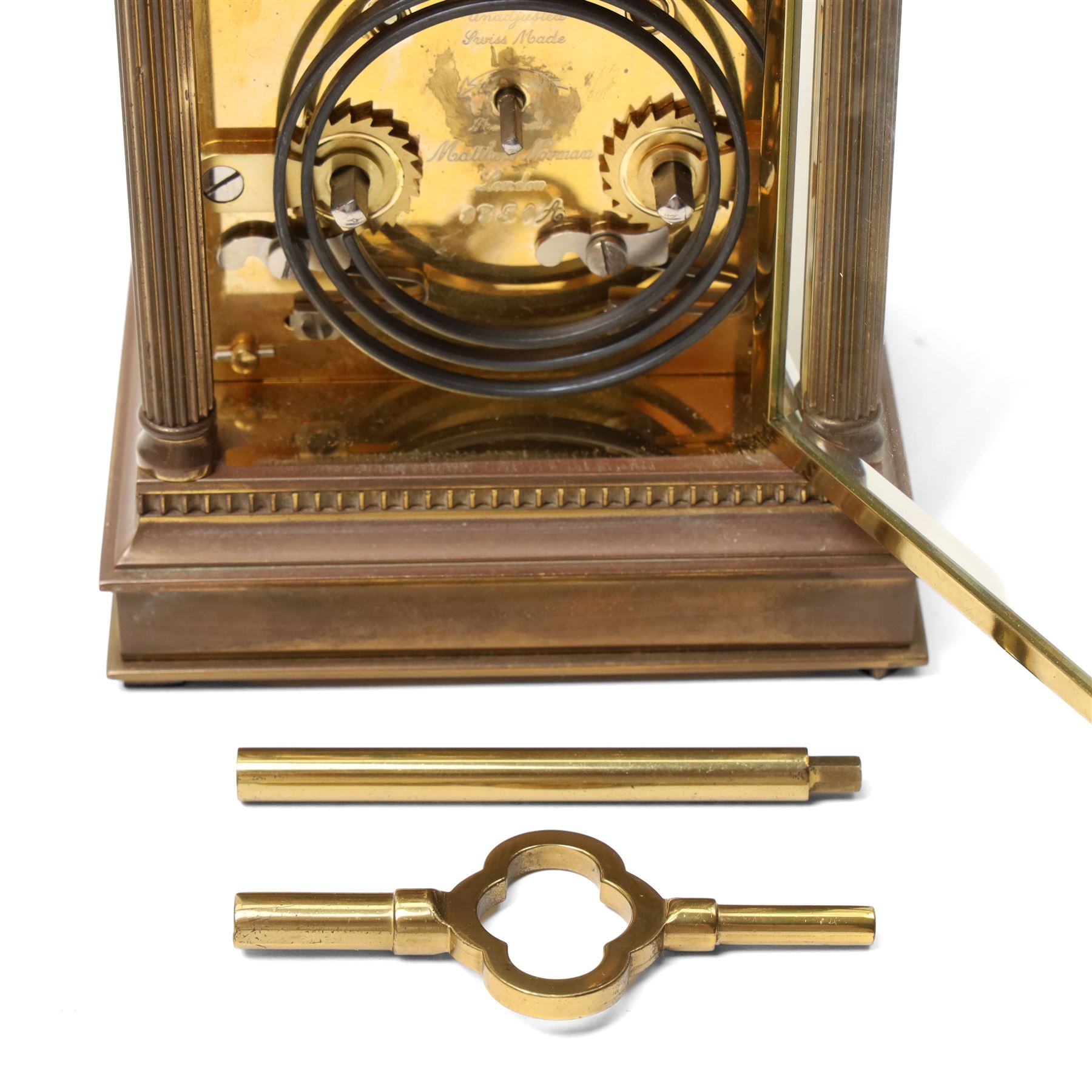 Matthew Norman - Modern repeating carriage clock with Swiss movement, white dial, brass and bevelled glass case H14cm, boxed and a miniature carriage clock by the same maker H9cm, boxed (2) 