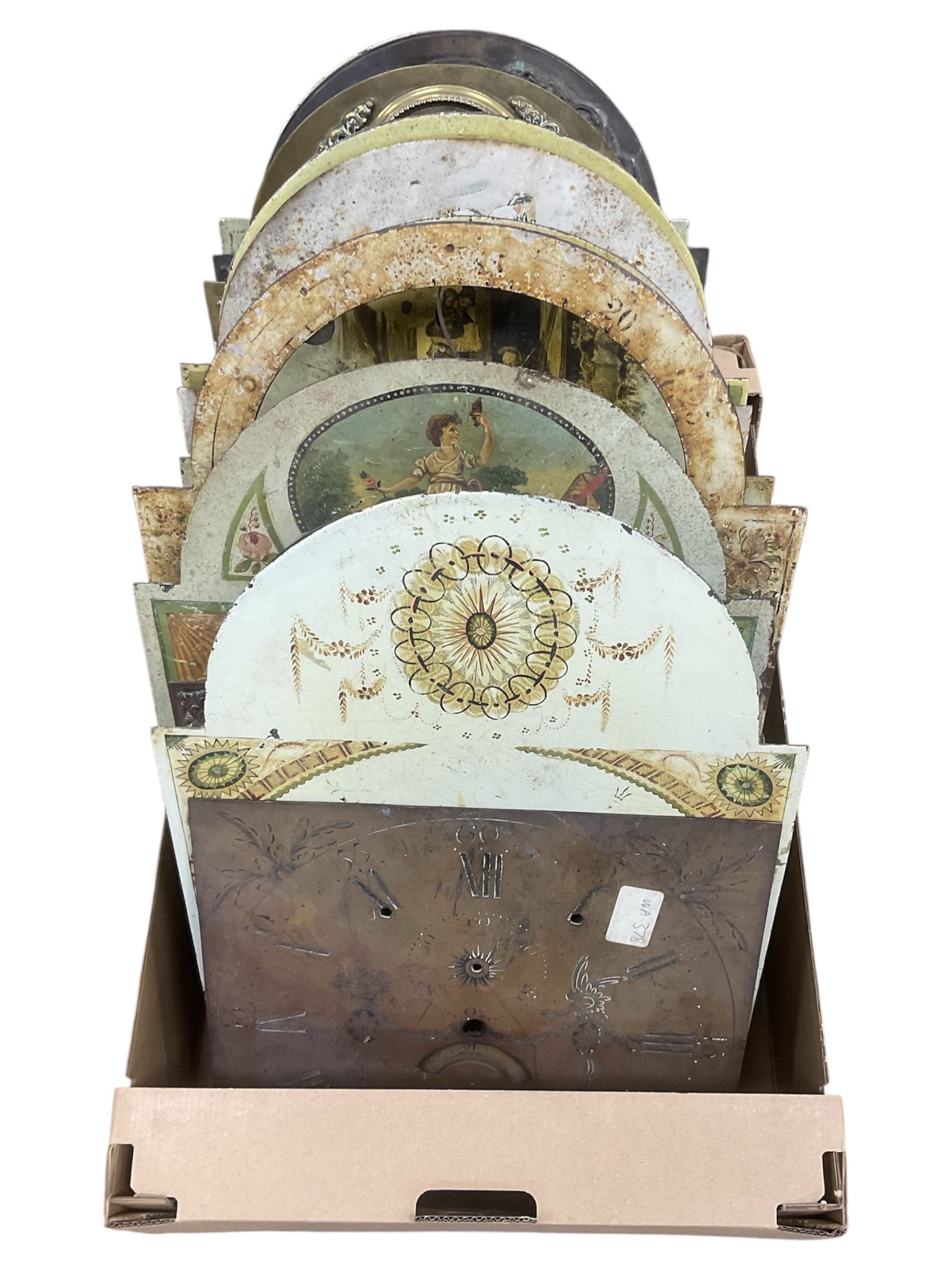Approximately thirteen longcase clock faces, mainly 18th and 19th century, including brass and painted dials