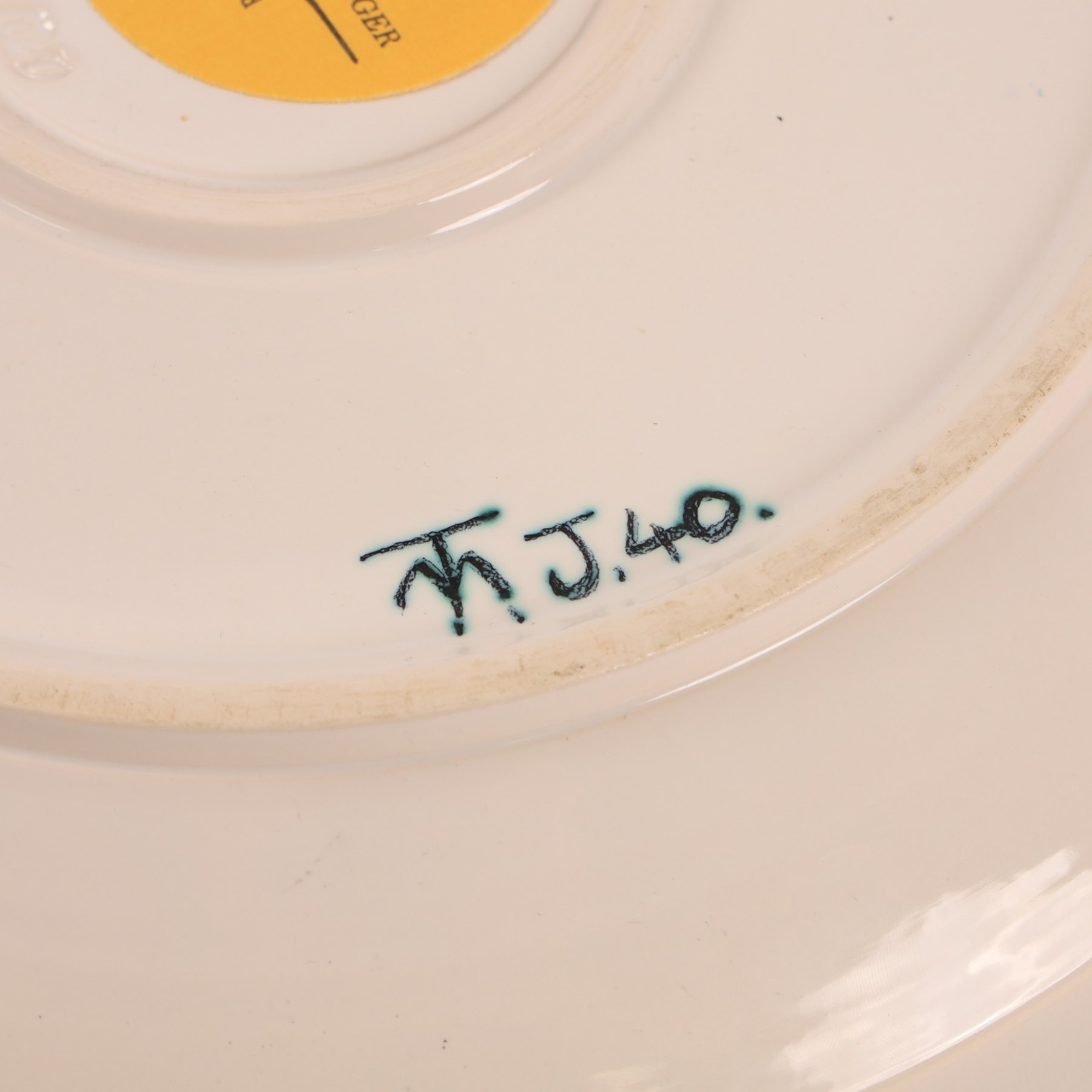 Tony Morris (British 1942-2018) for Poole Pottery: Studio pottery bowl of shallow circular form, thrown by Alan White, glazed and decorated by Tony Morris, impressed and painted marks to base, printed and painted marks beneath D35.5cm