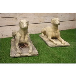  Pair composite stone recumbent dogs, L72cm  