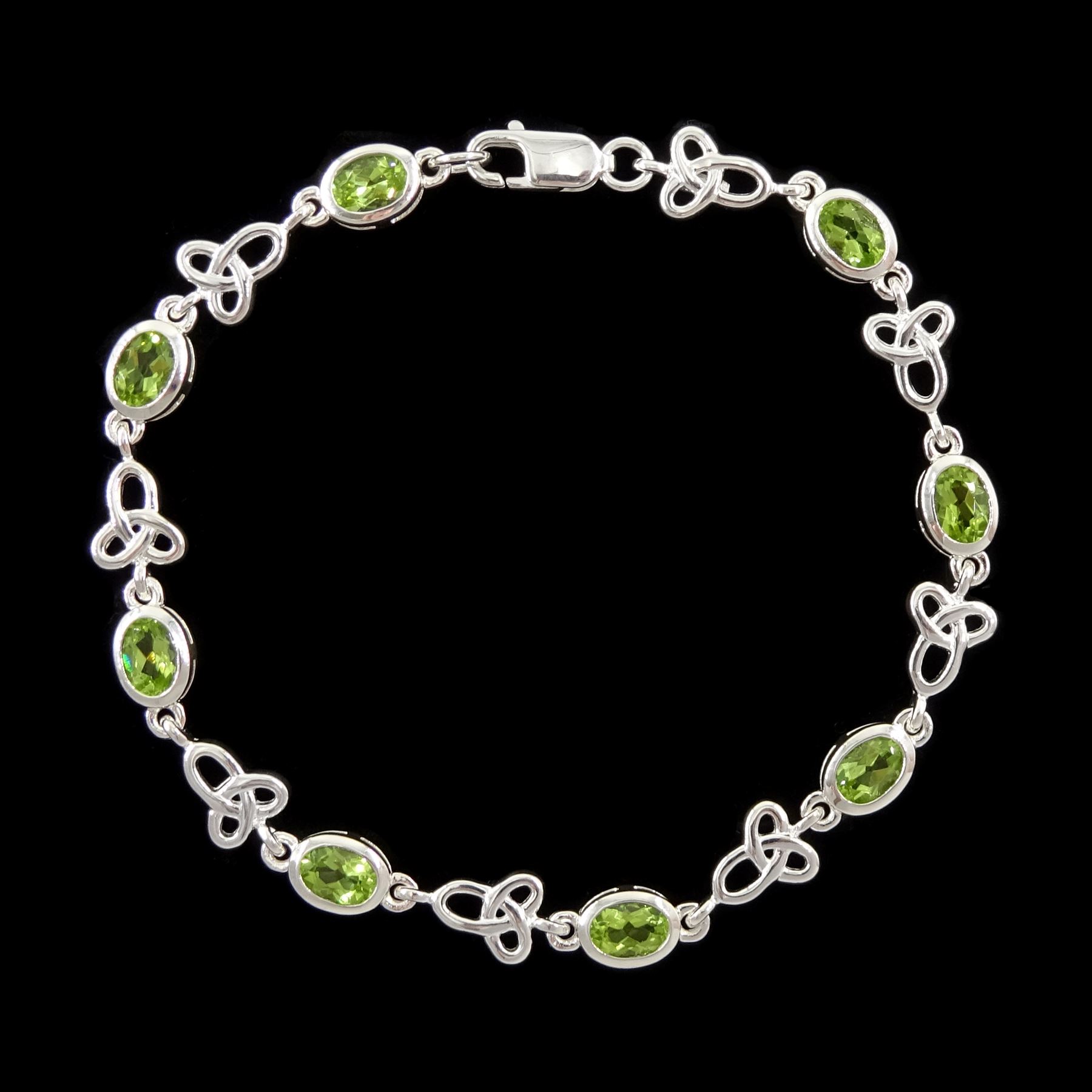 Silver peridot and Celtic design link bracelet, stamped 925