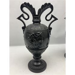 Pair of late 19th century continental black glazed urn shaped two-handled vases with classical style decoration H39cm