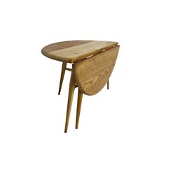 Ercol - elm and beech '308 Folding Occasional Table', circular top with gate-leg and splayed tapering supports