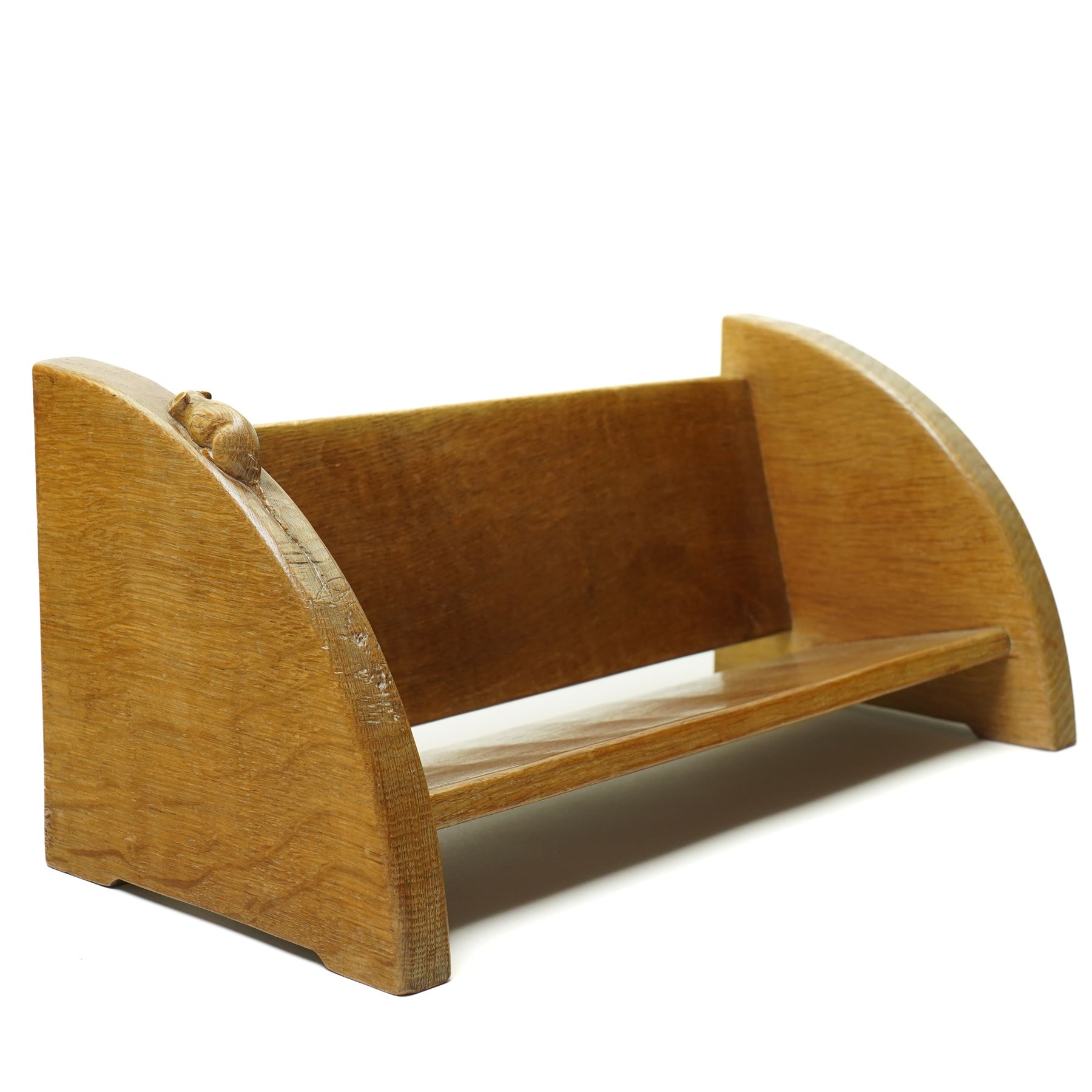 Mouseman - oak book trough, curved end supports, with carved mouse signature, by the workshop of Robert Thompson, Kilburn W46cm