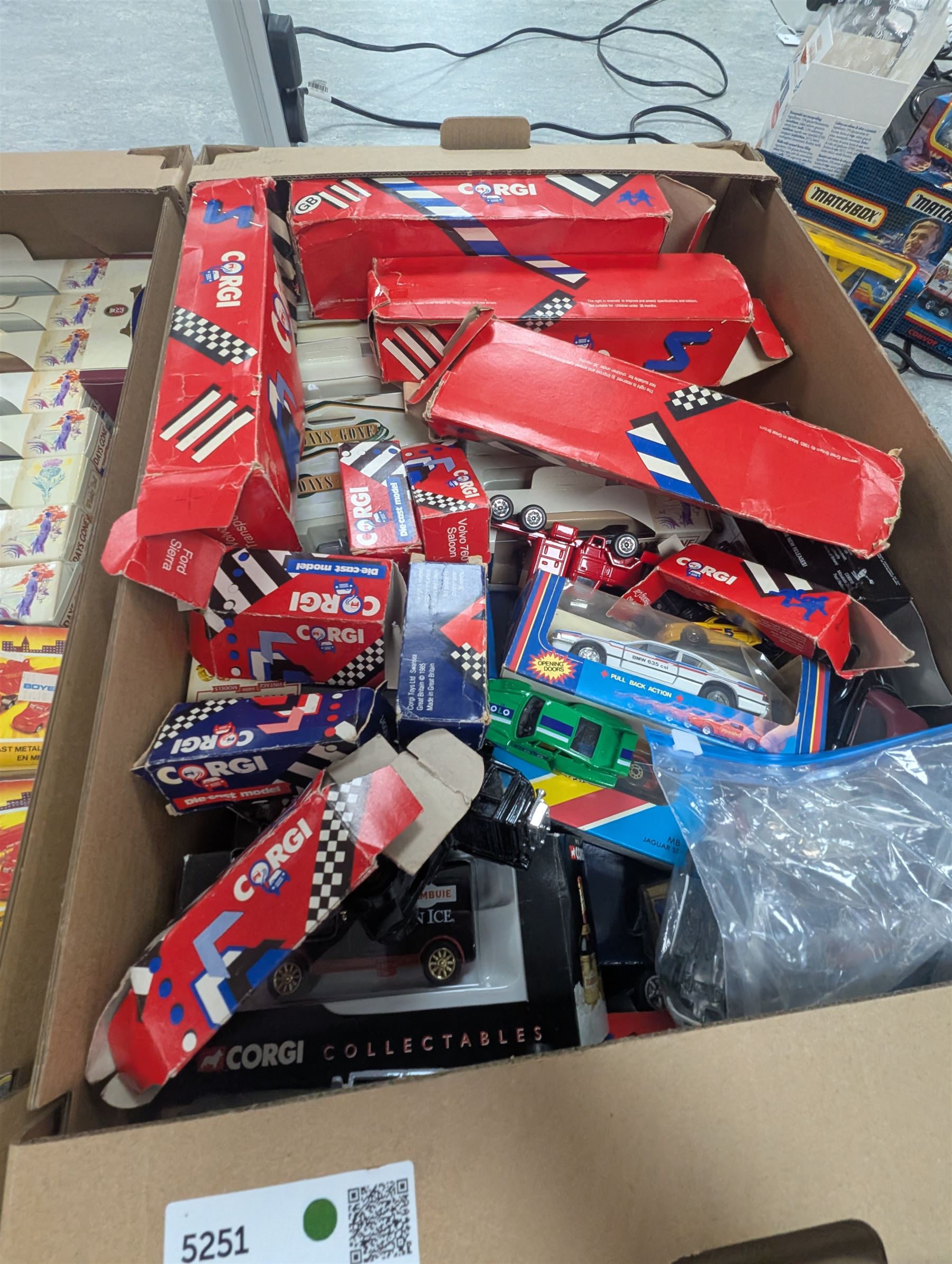 Collection of diecast model cars, incluidng Lledo Days Gone and Corgi examples, all boxed, in three boxes