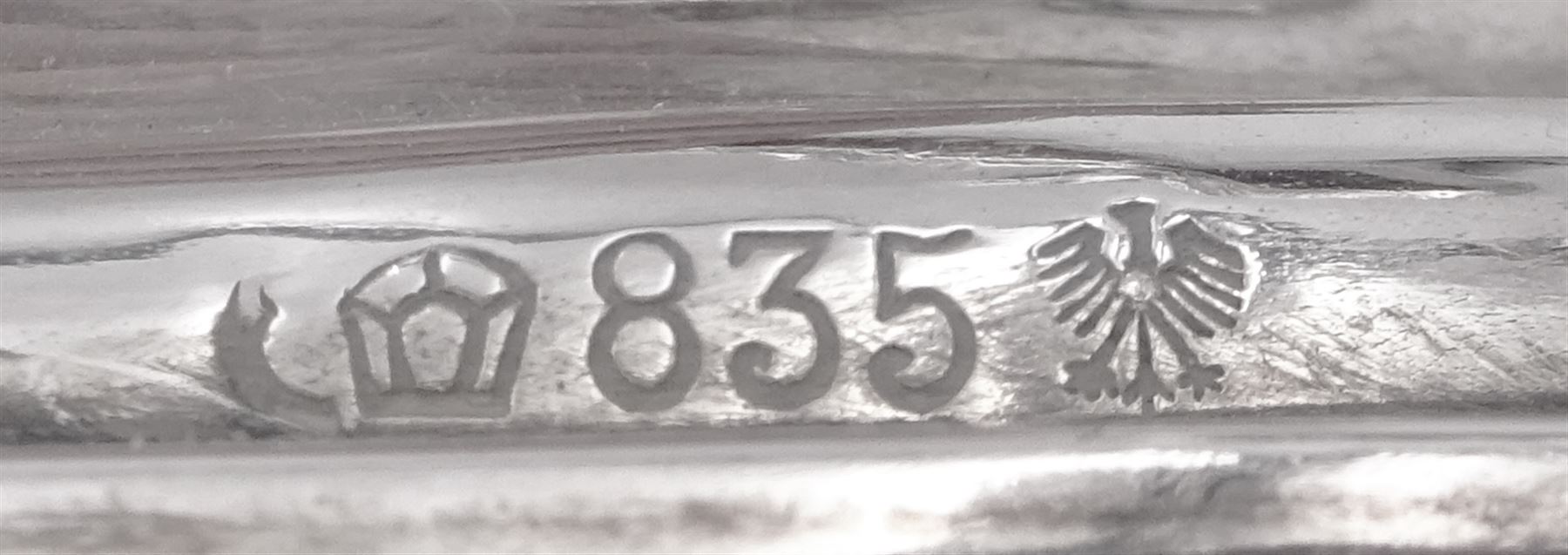 Pair of 20th century German silver three light twin branch candelabra, with wrythen twist detail throughout, each with crown and crescent mark, stamped 835 and bearing mark for Bruckmann & Sohne, Heilbronn, H21cm W25cm