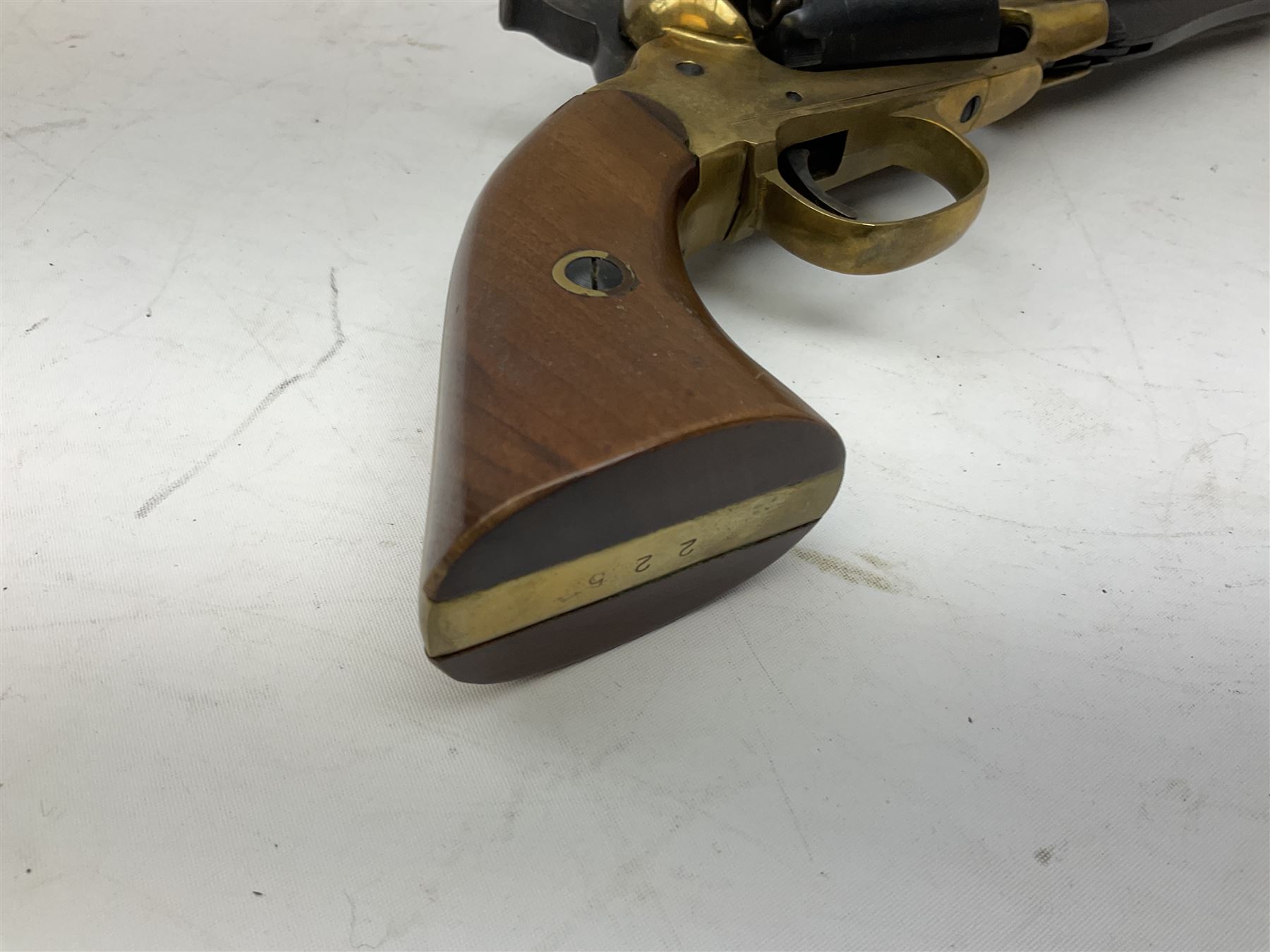 REGISTERED FIREARMS DEALER ONLY Modern Remington .44 calibre percussion brass framed army revolver, possibly by Uberti, with 16cm octagonal barrel, No.225; partially deactivated to old specification with no certificate L36cm overall - Disposed 25.06.25 - Notified 24.07.25