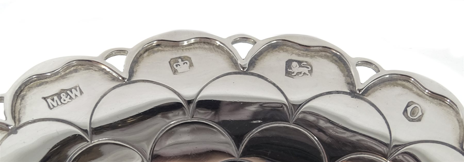 Silver Art Deco christening mug, engraved decoration by Stower & Wragg Ltd, Sheffield 1939, silver scalloped design, pedestal bon bon dish by Mappin & Webb, Sheffield 1956 and a silver small dish by William Comyns & Sons Ltd, approx 9.5oz