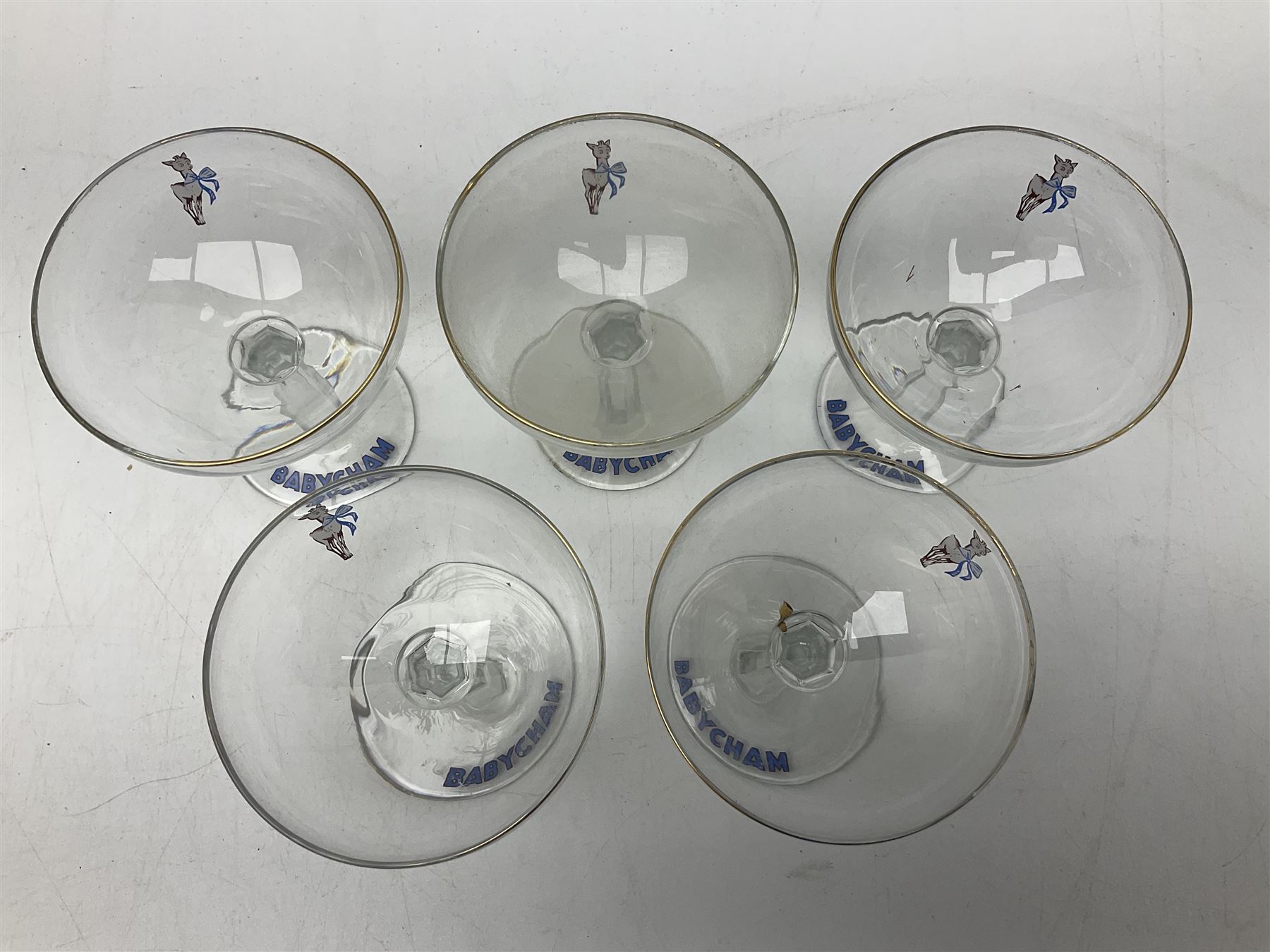Five Babycham glasses, together with five paperweights, to include examples from Liskeard glass etc